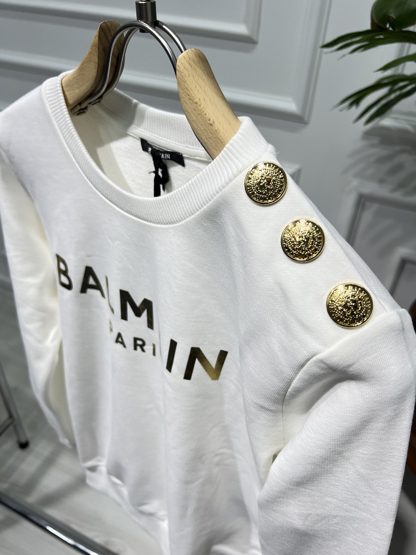 White sweatshirt with gold Balmain Paris print for women