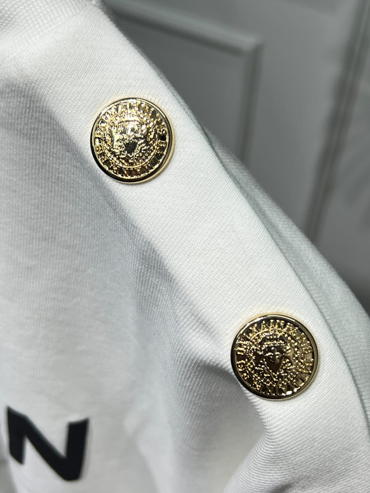 Cropped white sweatshirt with Balmain Paris Print for women