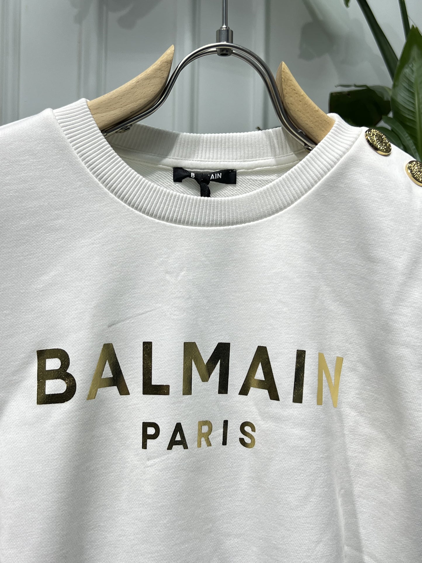 White sweatshirt with gold Balmain Paris print for women