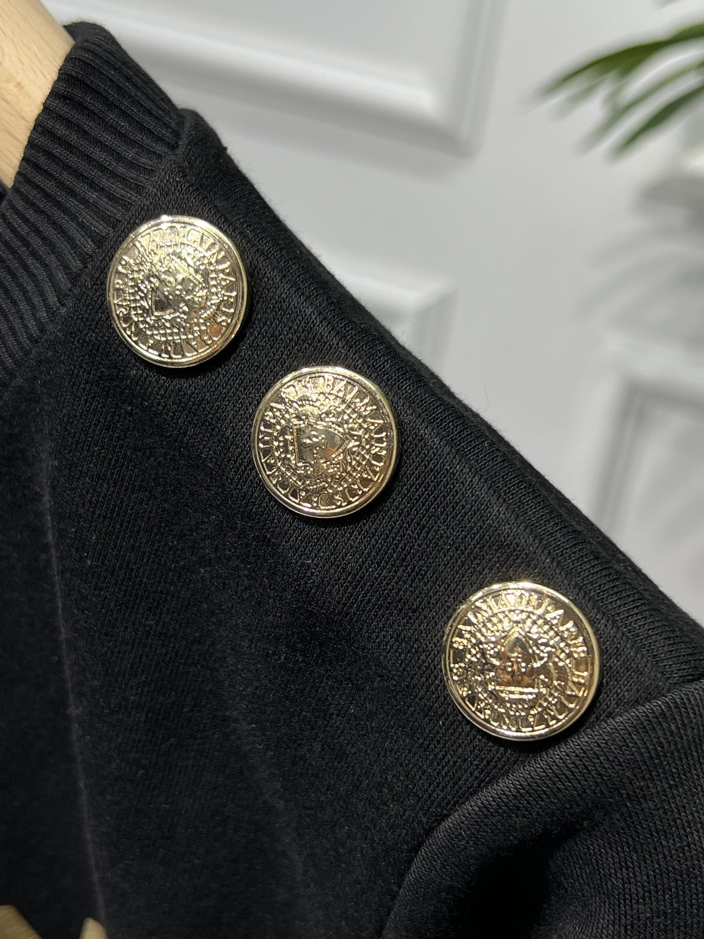 Black sweatshirt with gold Balmain Paris print for women
