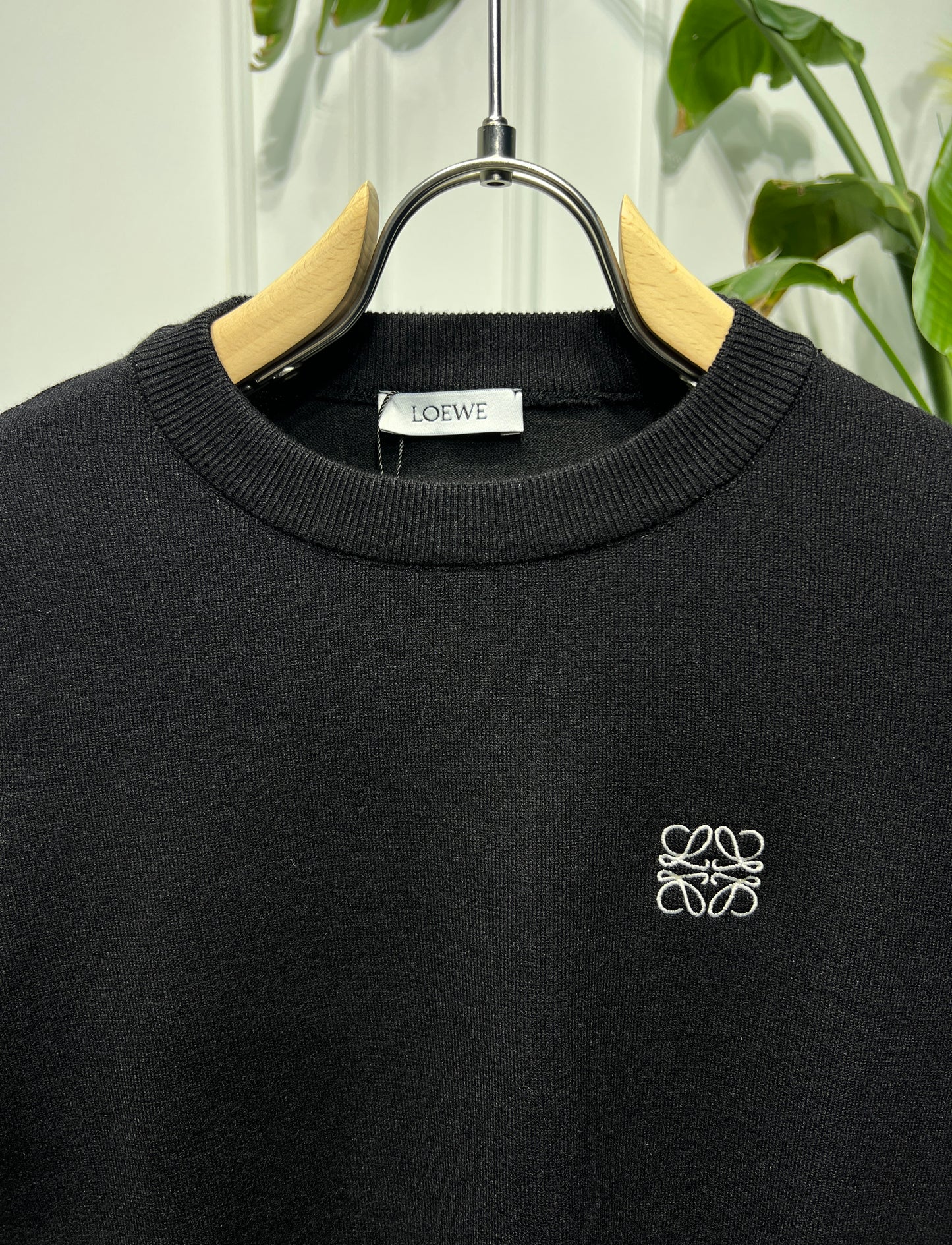 Embroidered logo black pullover for women